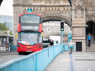 Bus driving across Tower Bridge