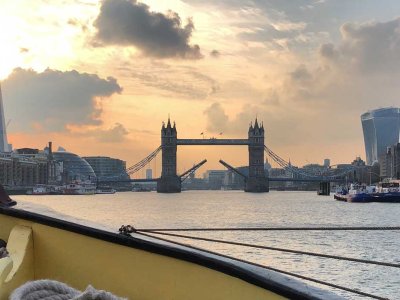 Bridge Lift during sunset, taken from a vessel approaching Tower Bridge