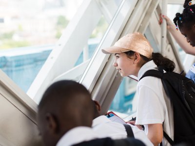 Tower Bridge Learning - pupils looking out the window