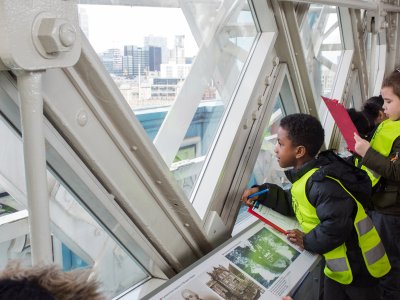 Tower Bridge Learning - completing worksheets looking out at the London Skyline