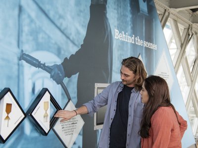 Visitors inside Tower Bridge's West Walkway