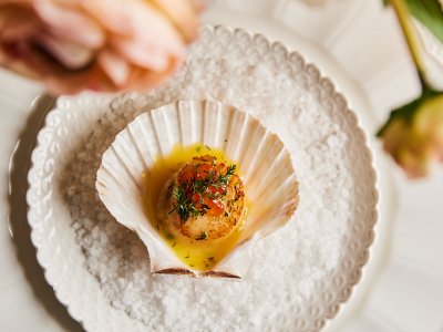 A plate of food on a beautifully decorated table