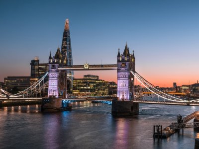 Tower Bridge at night with the Shard in and city in the background. 