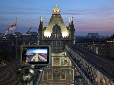 A small camera films a view of Tower Bridge at sunrise