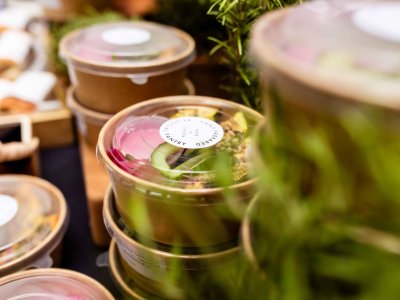 A table full of lunch pots containing delicious food