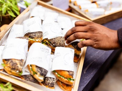 A table filled with delicious-looking fresh sandwiches
