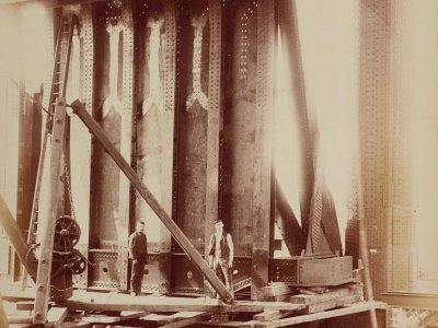 Sepia photograph of Tower Bridge under construction