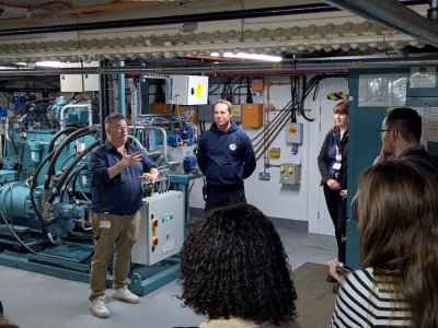A British Sign Language interpreter and tour guide on a Behind-the-Scenes tour at Tower Bridge
