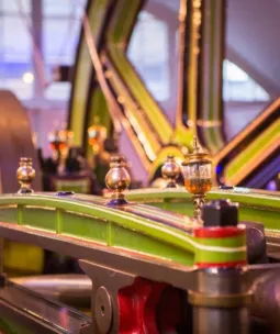 The moving parts of a large 19th century steam engine