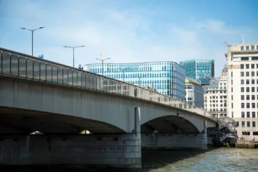 A minimalist London Bridge on a sunny day in its 60s architectural syle.
