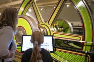 Two visitors at the Engine Rooms at Tower Bridge.