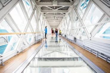 Walkways at Tower Bridge with uniformed staff and visitors