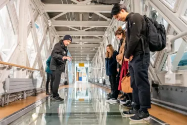 A group of guests on a guided tour at Tower Bridge.