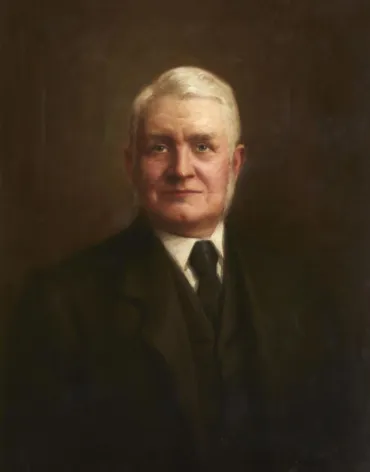 A painting of an elderly man with grey hair wearing a black suit and tie.