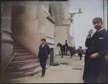 Two men in a three-piece suit on Tower Bridge