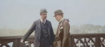Two men in victorian dress in a historic photograph
