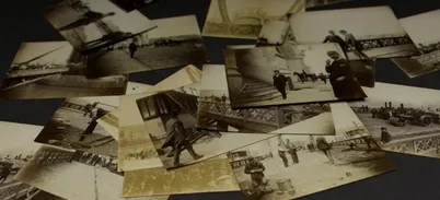 Sepia toned Victorian photos of Tower Bridge on the table