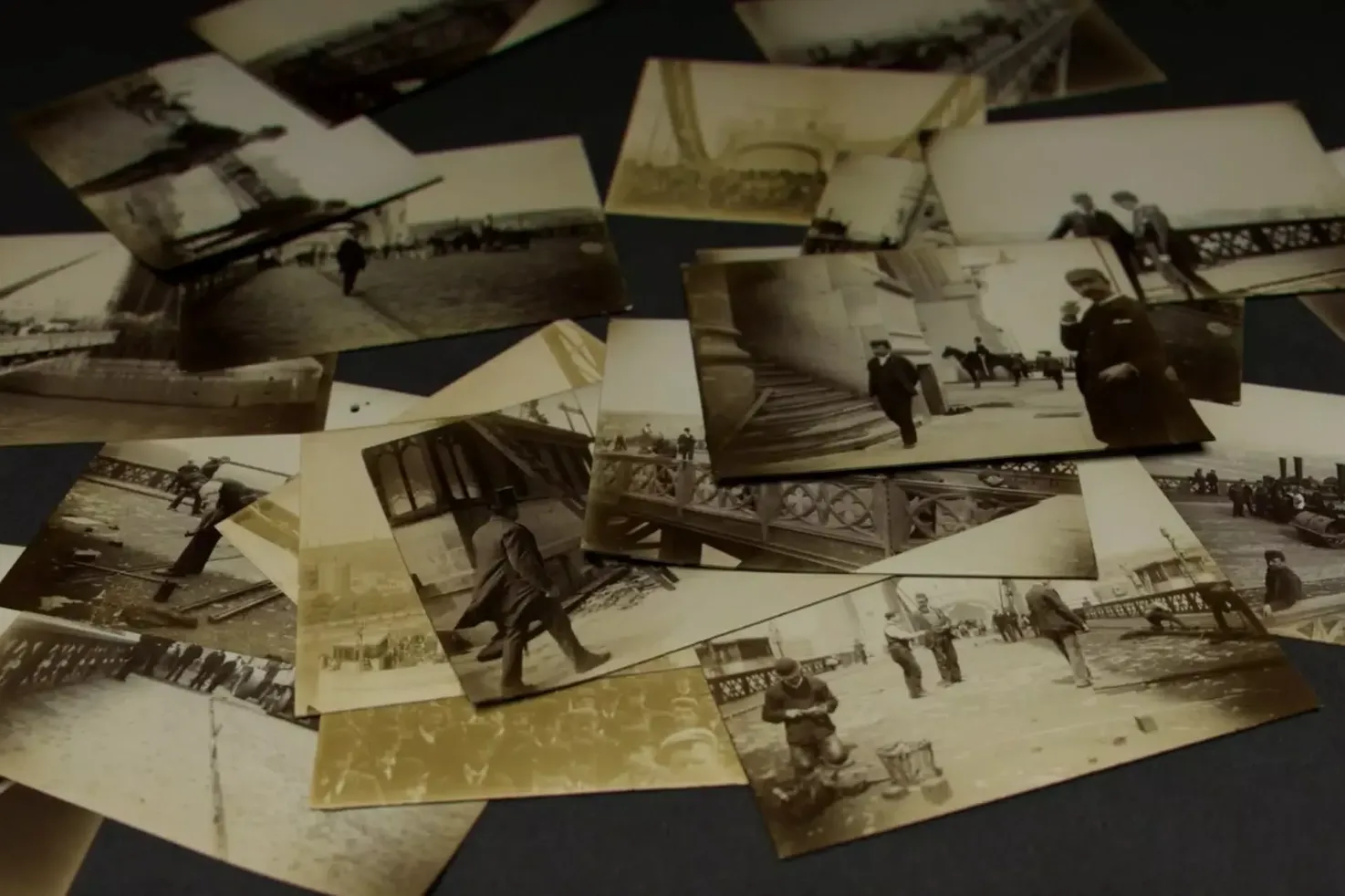 Sepia toned Victorian photos of Tower Bridge on the table