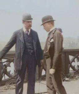 Two men in victorian dress in a historic photograph