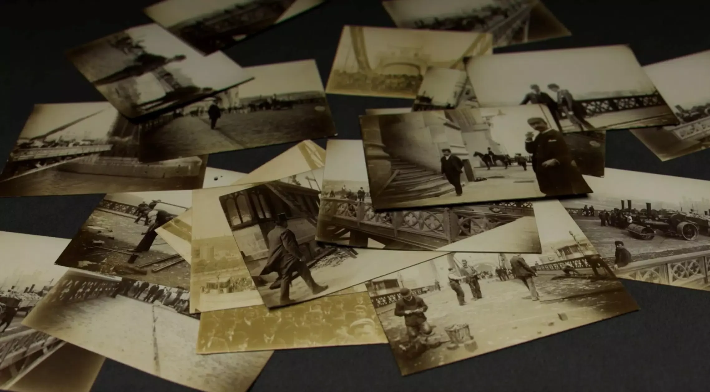 Sepia toned Victorian photos of Tower Bridge on the table