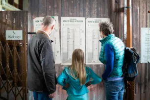 Visitors looking at the exhibition at Tower Bridge