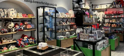 Products such as pins, puzzles, soft toys in the Tower Bridge Gift shop