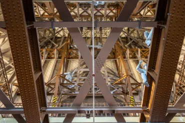 Statues of workers in the ceiling of South Tower at Tower Bridge.