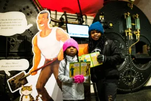 Two children participating the Tower Bridge Cat Trail