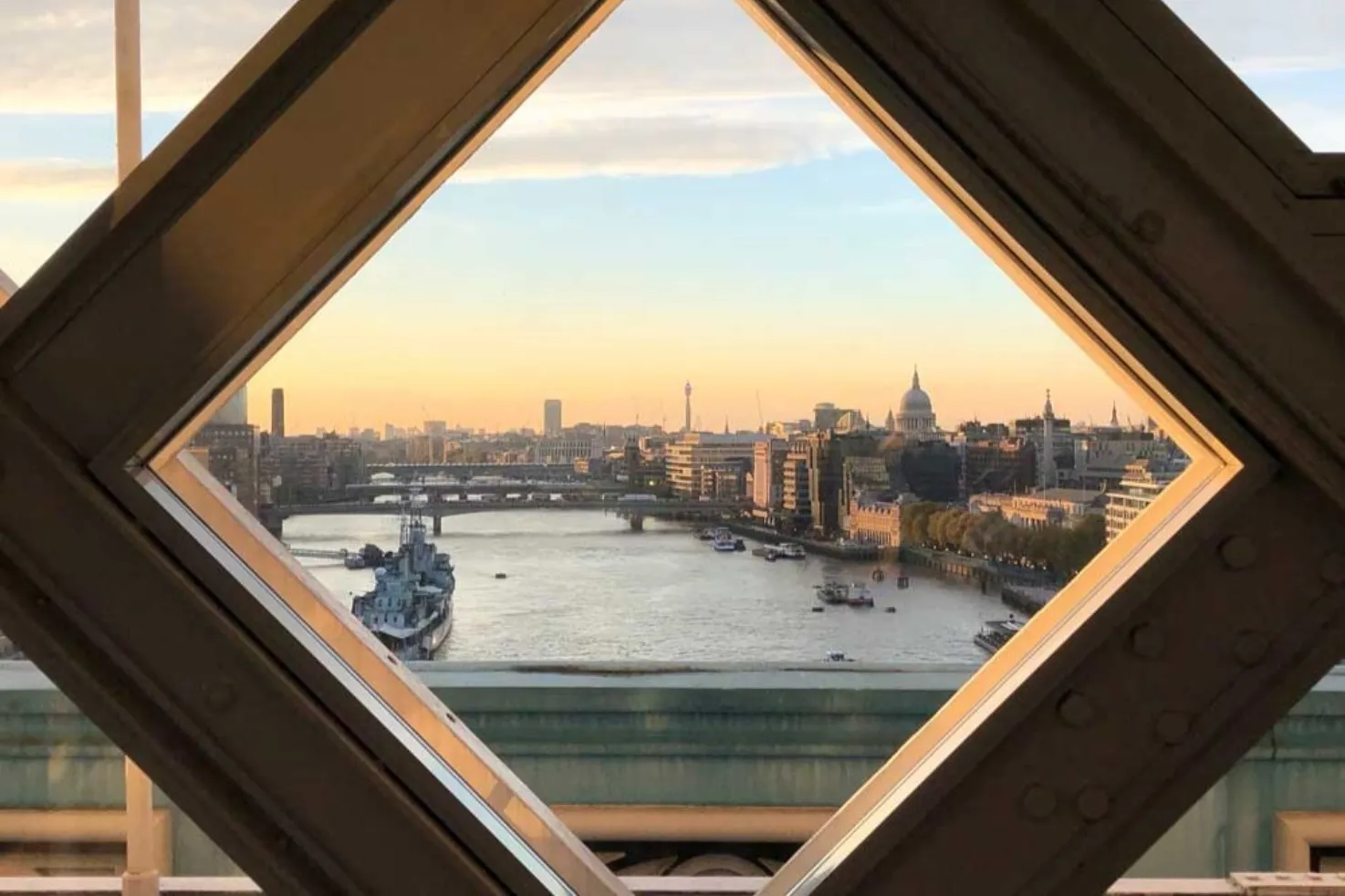 London views out of a window on the High-level Walkways at Tower Bridge