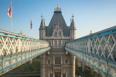 One of the Towers of Tower Bridge is central with the two High-Level Walkways either side of it. The photo is taken from the height of the High-Level Walkways.