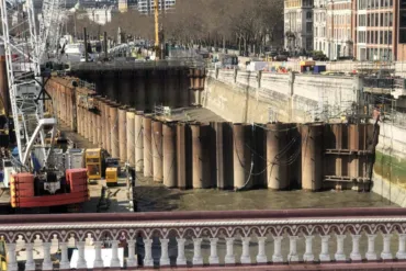 Modern day caisson emerging from the River Thames.